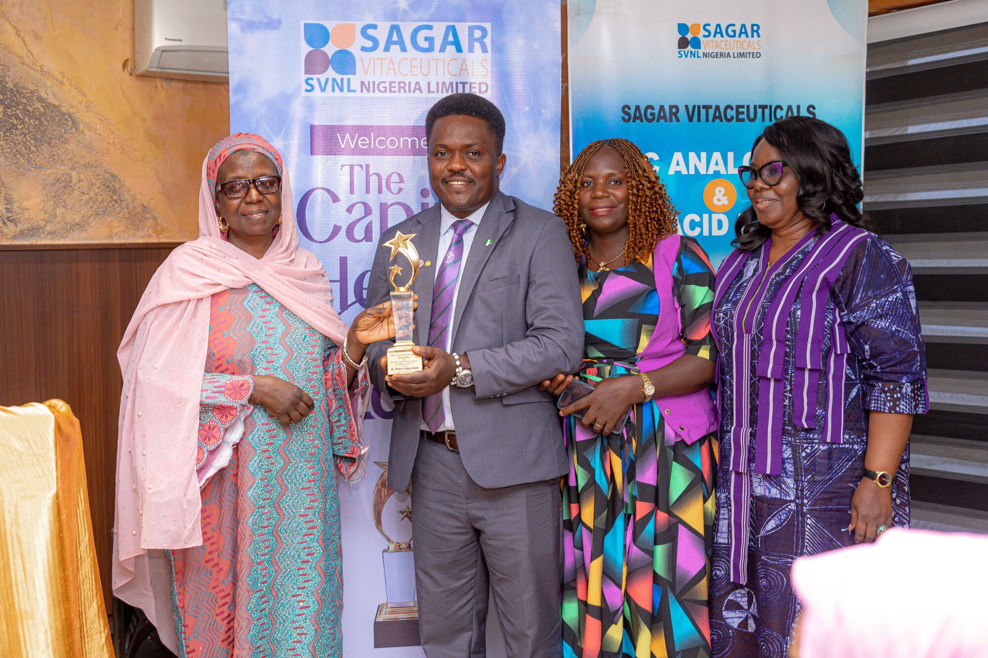 An award presentation during the inaugural ceremony